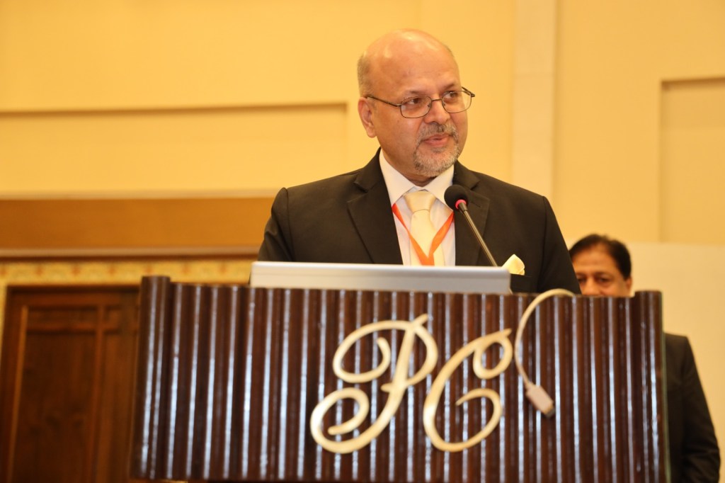 Dr. M. Khawar Nazir, an American-trained dermatologist, presenting at the FMEC Conference 2024, demonstrating his commitment to dermatological excellence.