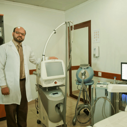 Dr. M. Khawar Nazir standing along modern updated aesthetic ALSER equipments