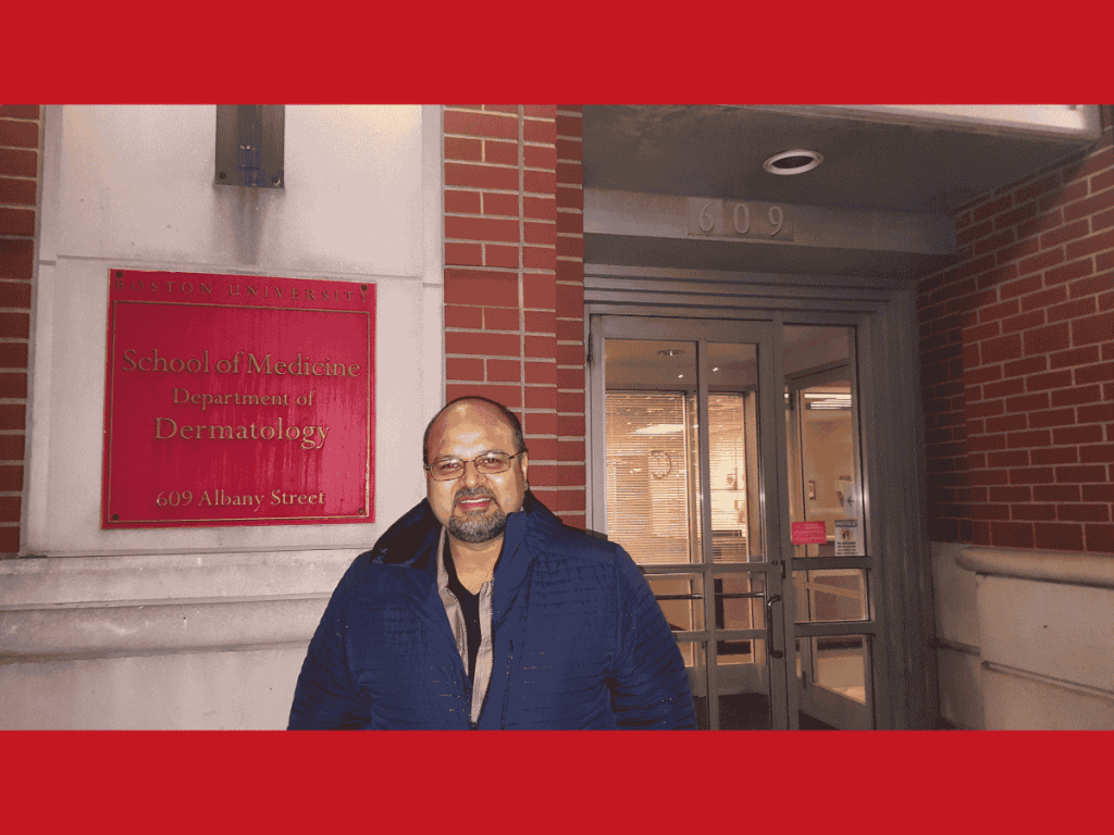 Dr. M. Khawar Nazir standing in front of the Boston University School of Medicine, Department of Dermatology sign at 609 Albany Street, highlighting his educational journey in dermatology.