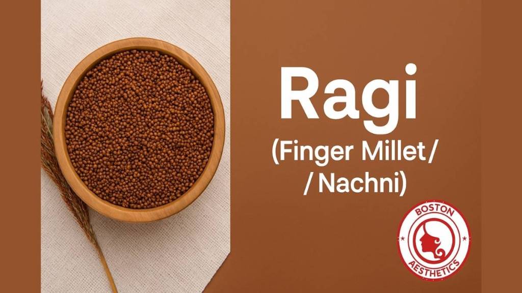 Natural image of Ragi (Finger Millet/Nachni) grains in a wooden bowl with Boston Aesthetics logo, promoting gluten-free, calcium-rich superfoods for bone health in Lahore.